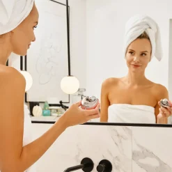 Gesichtsmassagegerät mit Kälte- und Wärmetherapie, rosa